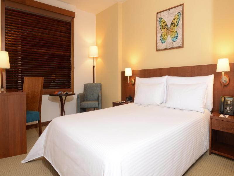 Hotel Habitel Select Bogotá Quarto foto